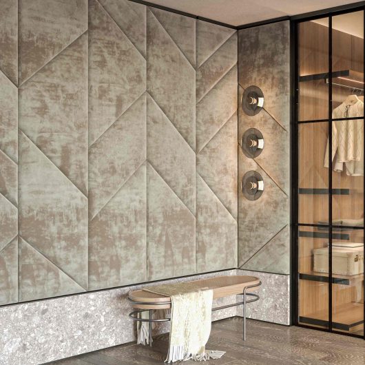 View of a walk-in closet with a wall covered in velvet boiserie with geometric panels