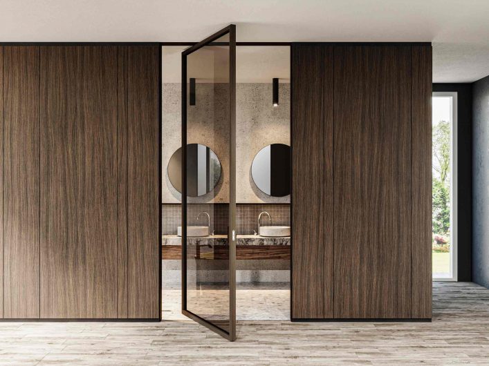 Lady pivot interior door in rosewood with transparent bronze glass