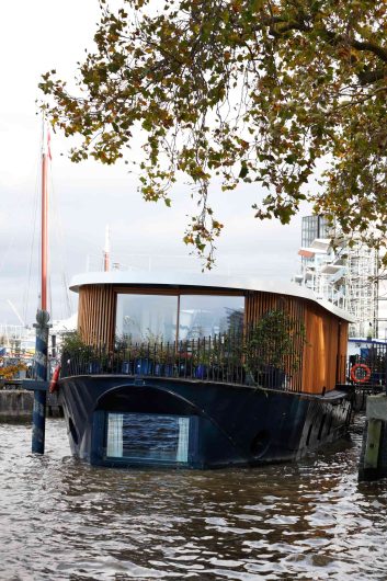 The London Floating Villa, view of the lift & slide in natural fir